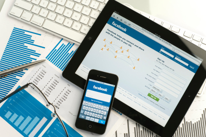 facebook-on-ipad-iphone-desk