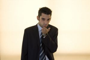 wearing a suit and blowing kisses wearing a suit and blowing kisses