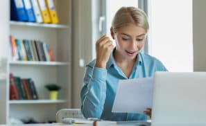 Excited woman reading mail letter with great news